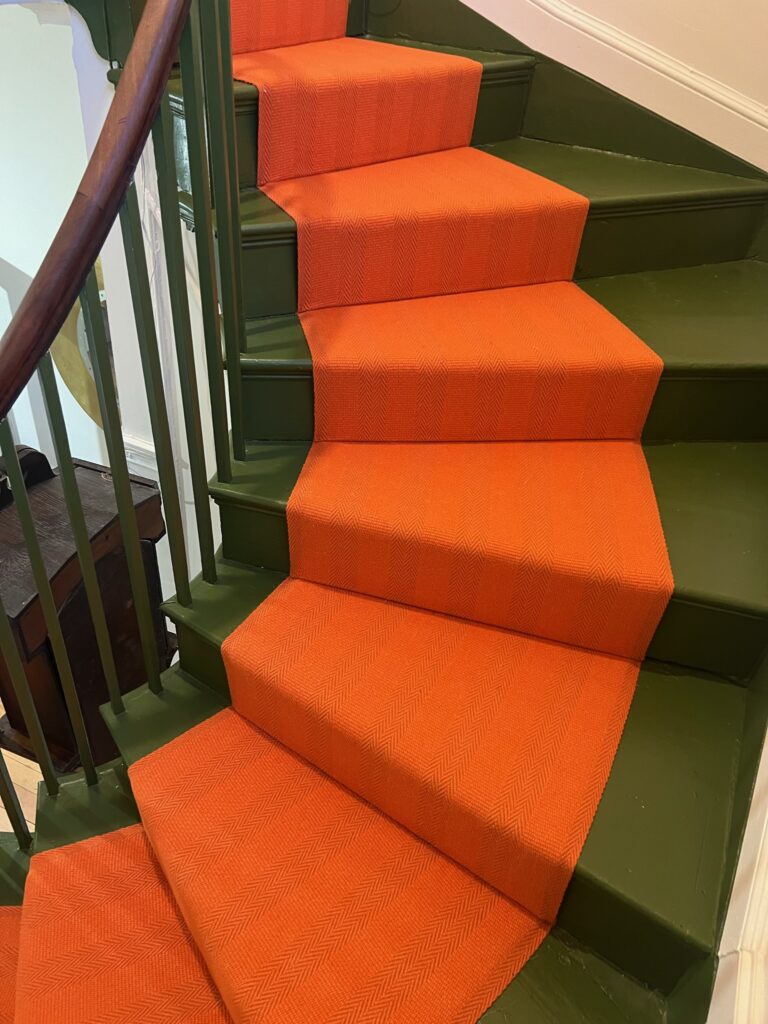 Orange stair runner