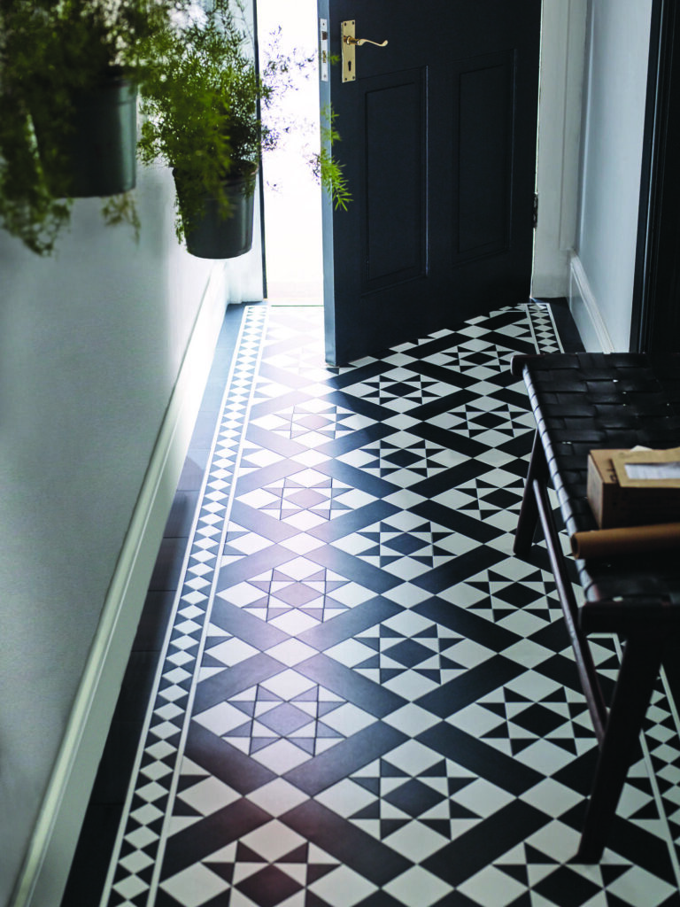 Amtico black and white LVT flooring in a hallway